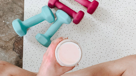 A Woman Enjoying a Healthy Protein Shake At the Gym