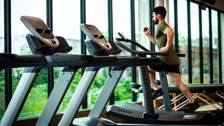 A Man Exercising at the Gym