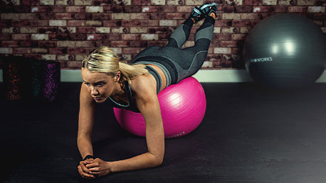Girl Exercising on a Proworks Exercise Ball