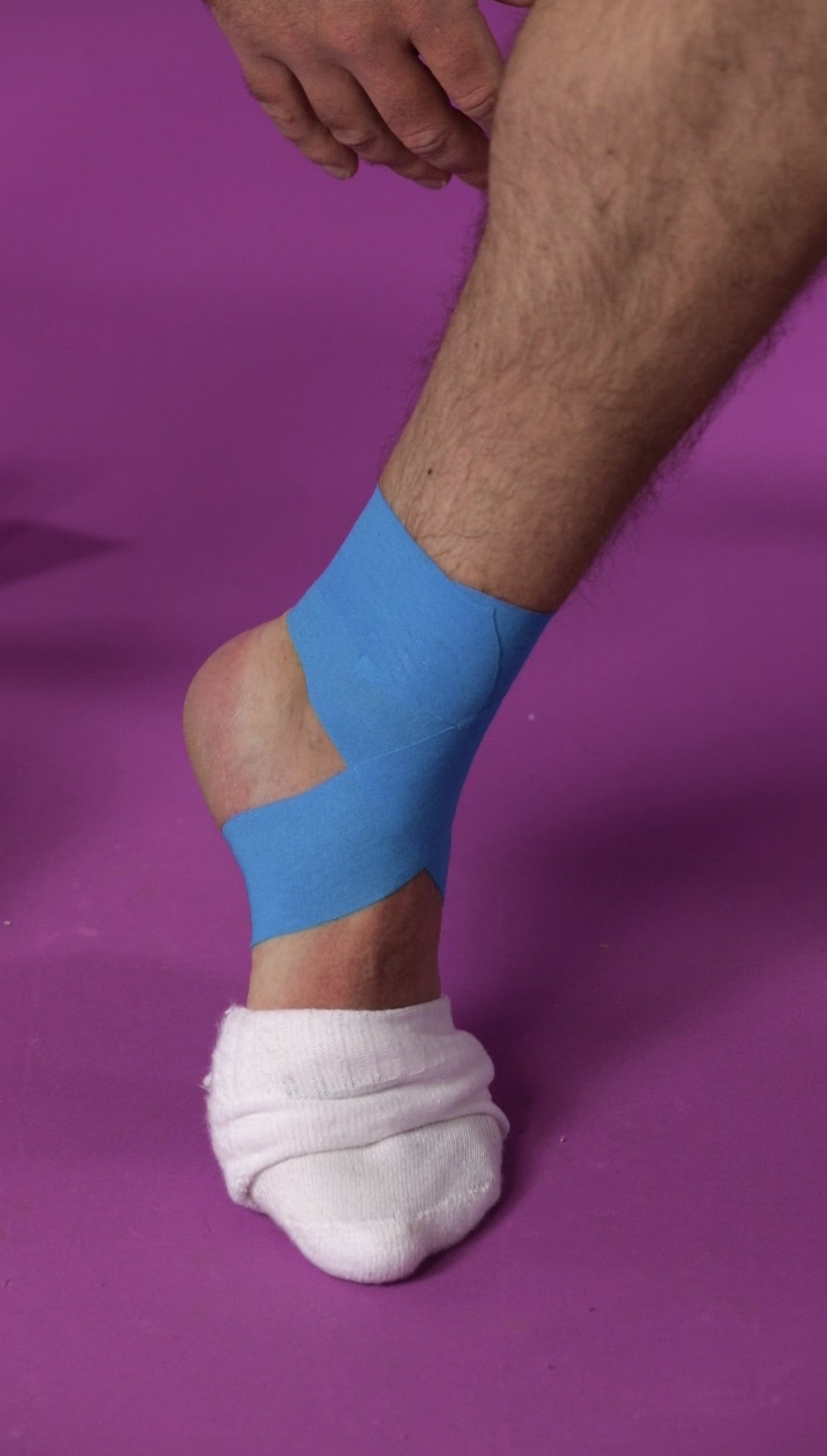 How to Strap a Sprained Ankle with Kinesiology Tape 