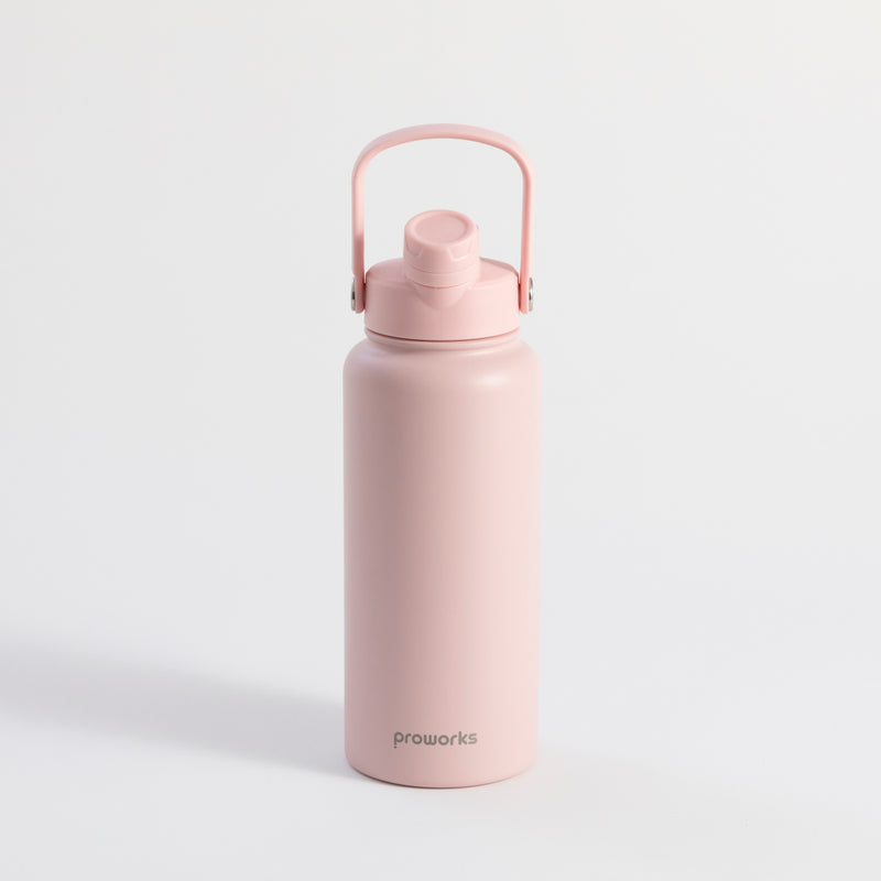 Proworks Switch 1L pink water bottle with straw in pink