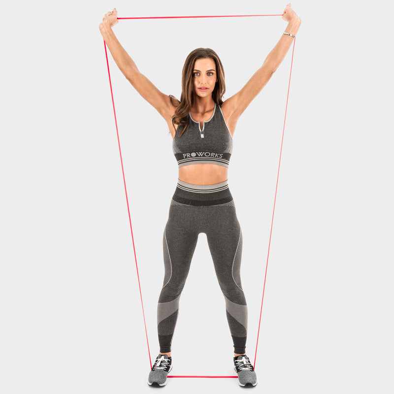 Woman Exercising with a Proworks Fitness Pull Up Resistance Band